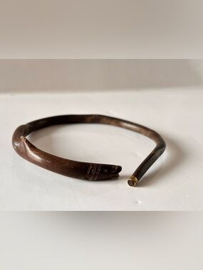 Vintage wooden fish carved with brass bracelet